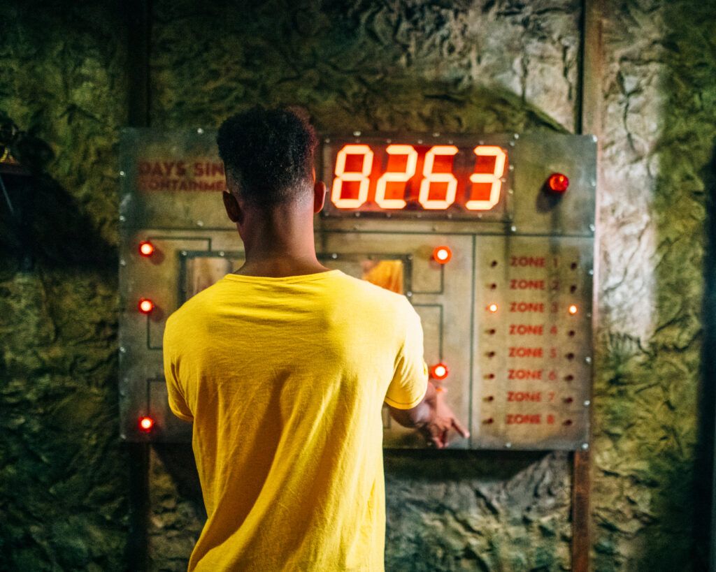 person solving an escape game puzzle