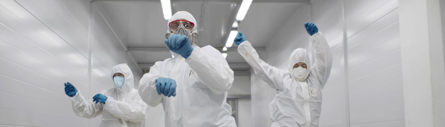 people in hazmat suits