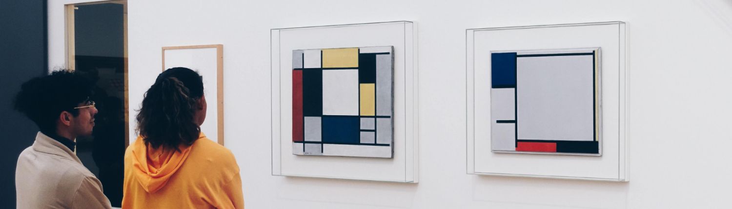 people looking at art