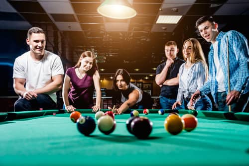 people playing pool