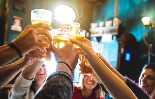 people toasting beer