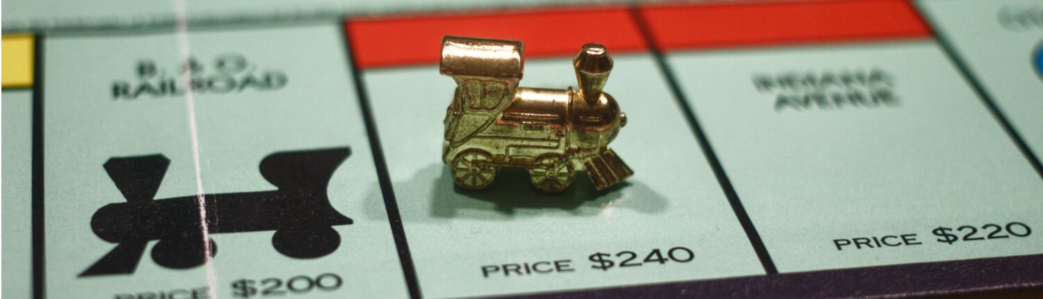 monopoly board and game piece