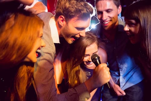 people singing karaoke