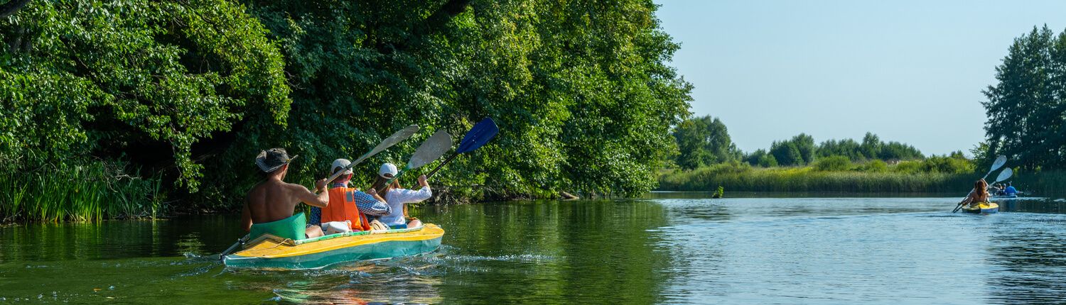 people kayaking together