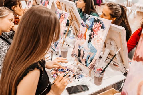 women in a painting class