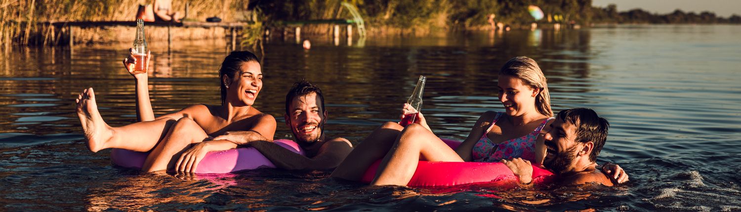 people floating and having fun down a river