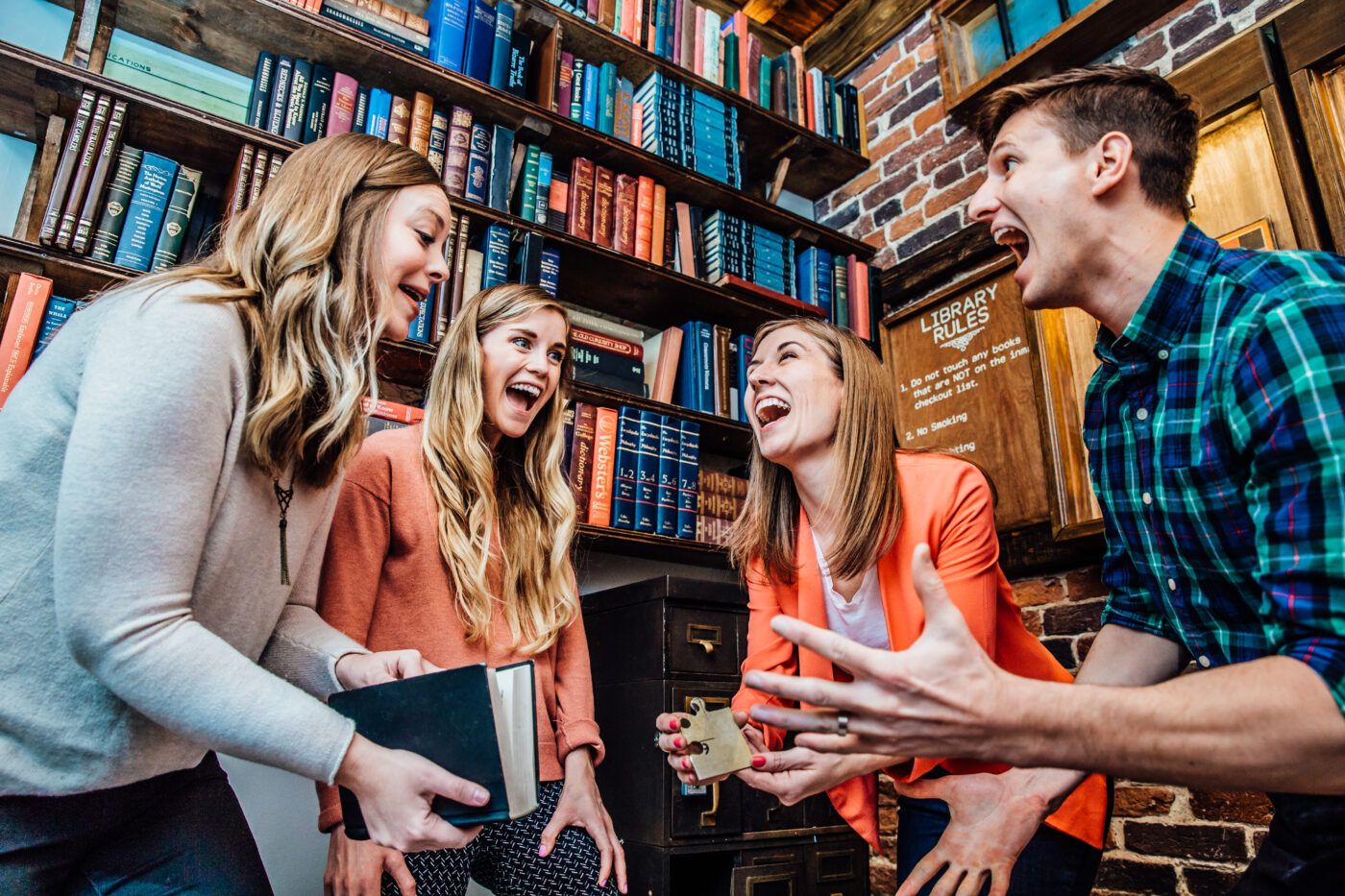 group playing prison break escape room at the escape game