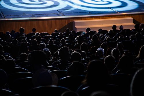 people sitting in a theater