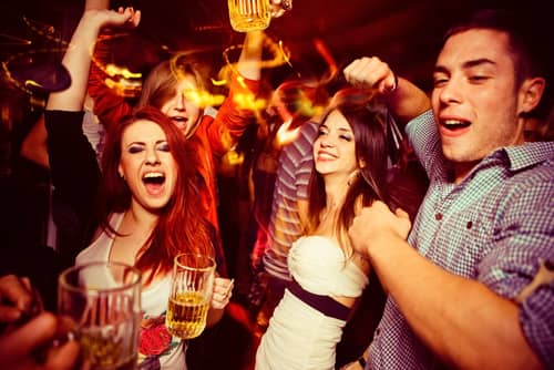 rowdy people at a bar
