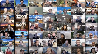 A grid of video call thumbnails featuring numerous people waving, with various backgrounds, including nature and office settings.