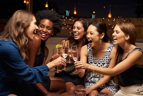 women drinking champagne